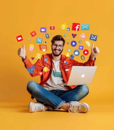 man-is-sitting-floor-with-laptop-his-legs-plain-background